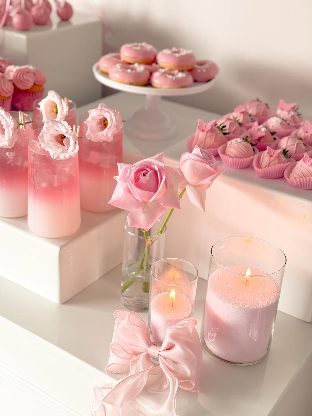 Powder pink summer interiors with blush-toned candles and ceramics