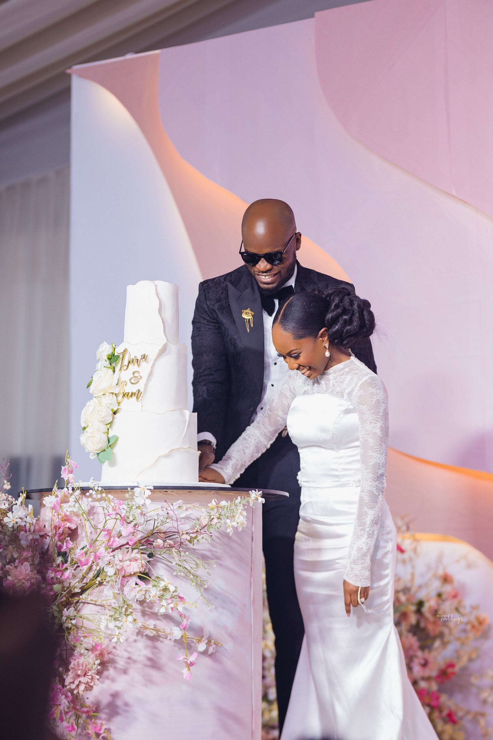 Bride and groom cutting the cake