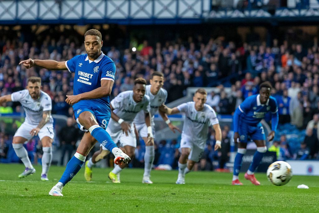 Cyriel Dessers scores from the penalty spot during Champions League qualifying