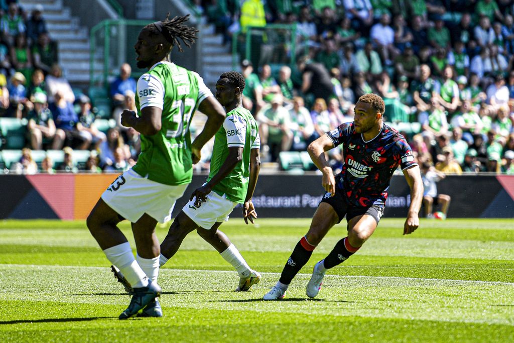 Cyriel Dessers celebrating a goal during a William Hill Premiership match at Easter Road