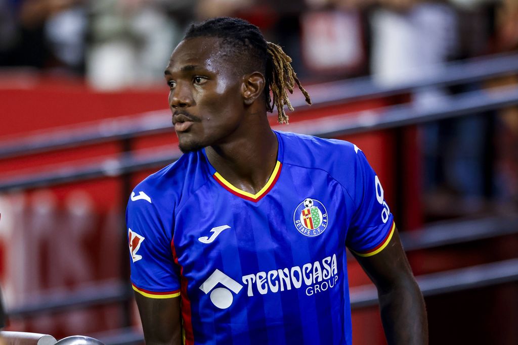 Christantus Uche playing in La Liga match between Sevilla FC and Getafe CF at Ramon Sanchez Pizjuan