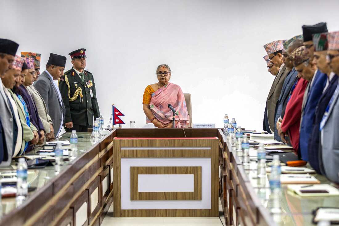 Nepal's interim Prime Minister Sushila Karki and officials observe a moment of silence for protest victims on September 14.