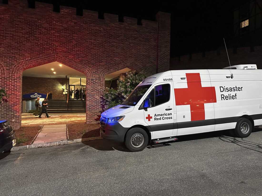 An American Red Cross Disaster Relief van stationed outside a hotel serving as a reunification center after the shooting at a country club in Nashua, New Hampshire, Saturday, Sept. 20, 2025.