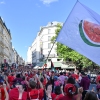 Protesters waving a white flag with a watermelon symbol during a Gaza solidarity march in Paris, July 8.