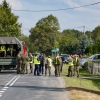 Police and army gather to inspect a house destroyed by debris from a shot down Russian drone in the village of Wyryki-Wola, eastern Poland, on September 10.