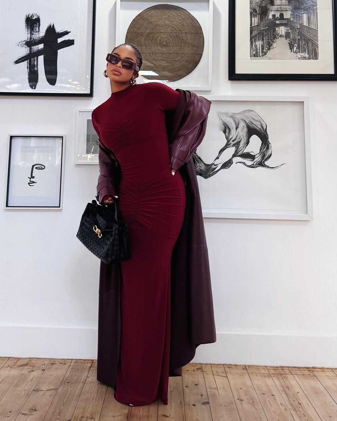 woman wearing maroon dress with matching coat
