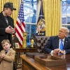 Tesla and SpaceX CEO Elon Musk with his son X Æ A-Xii and President Donald Trump in the Oval Office of the White House.