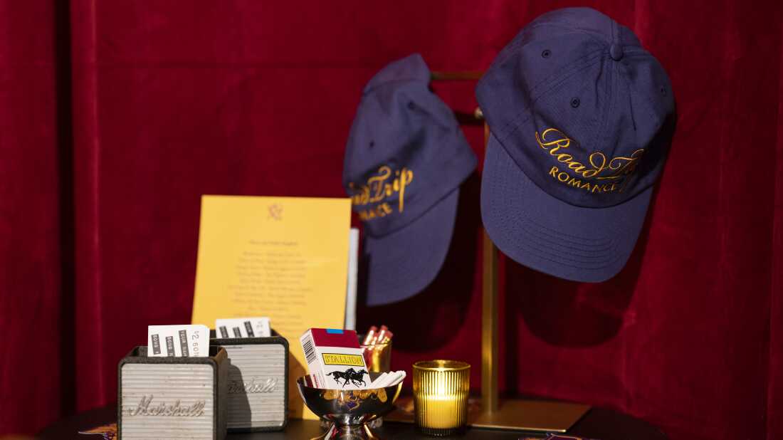 Exit Lane and 831 Stories merchandise displayed at a New York City karaoke bar