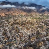 ALTADENA, CALIFORNIA - FEBRUARY 05: An aerial view shows homes burned in the Eaton Fire on February 05, 2025 in Altadena, California.