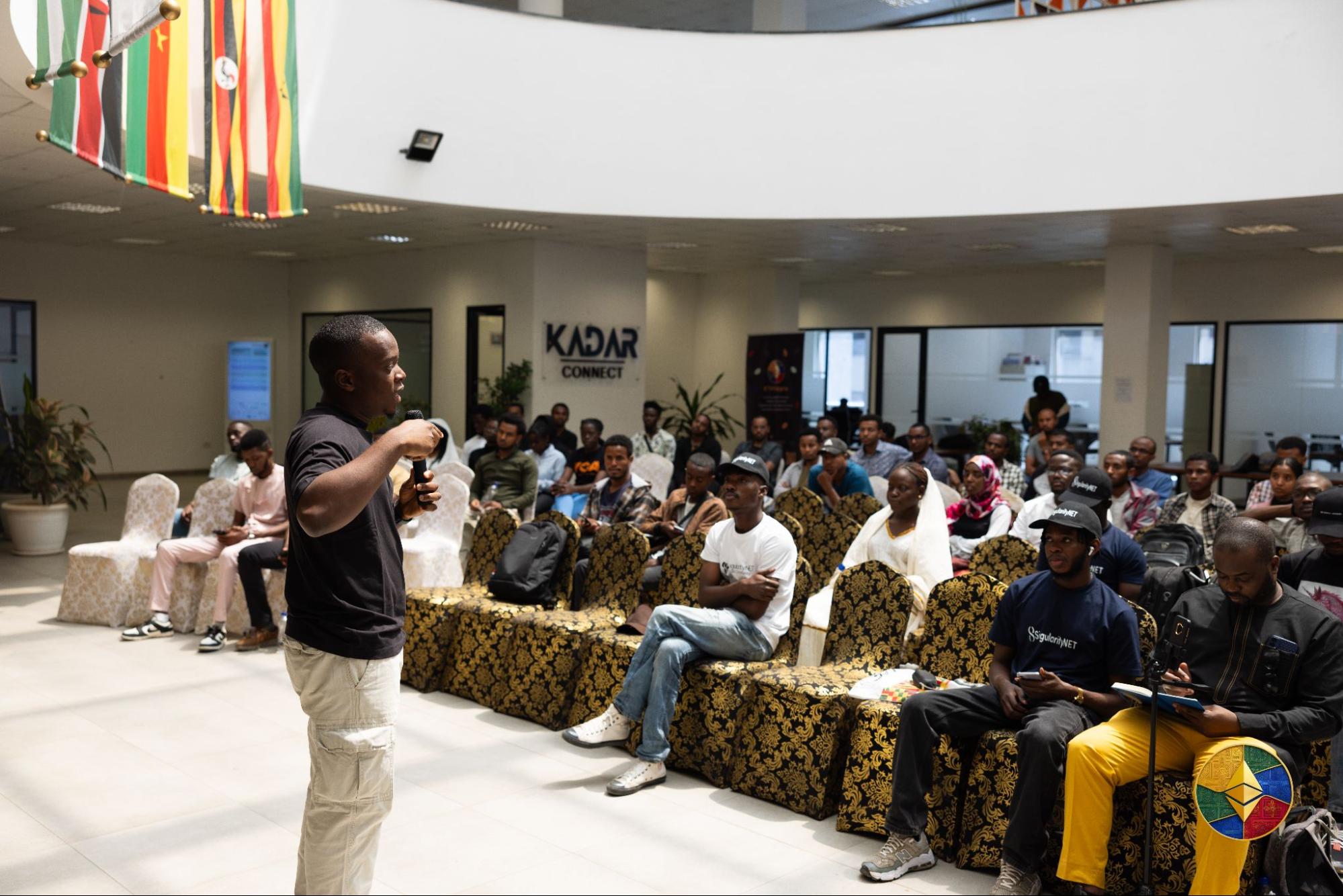 Samuel Arogbonlo making a presentation