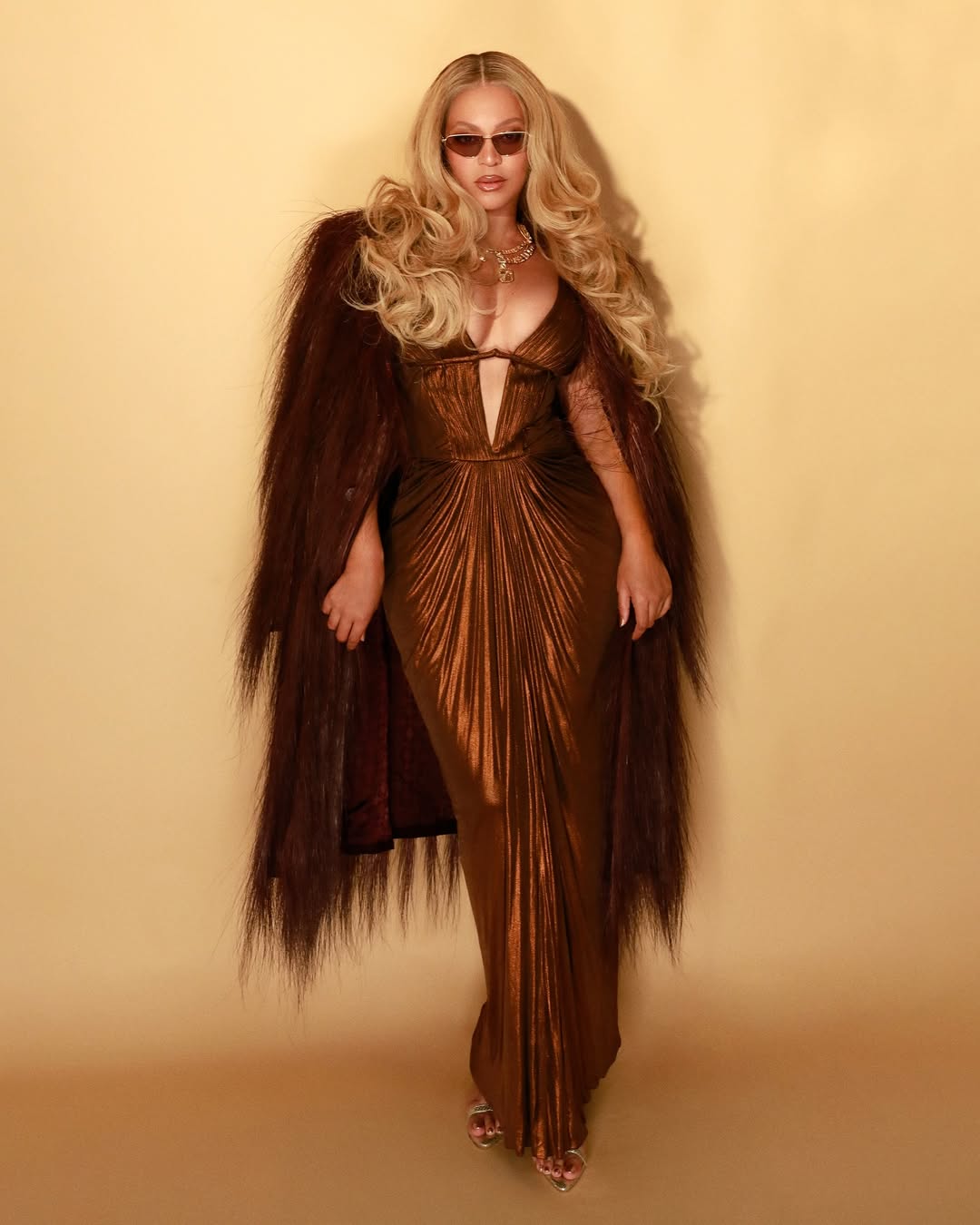 Beyoncé in a sparkling brown dress for her Instagram Casino Night post