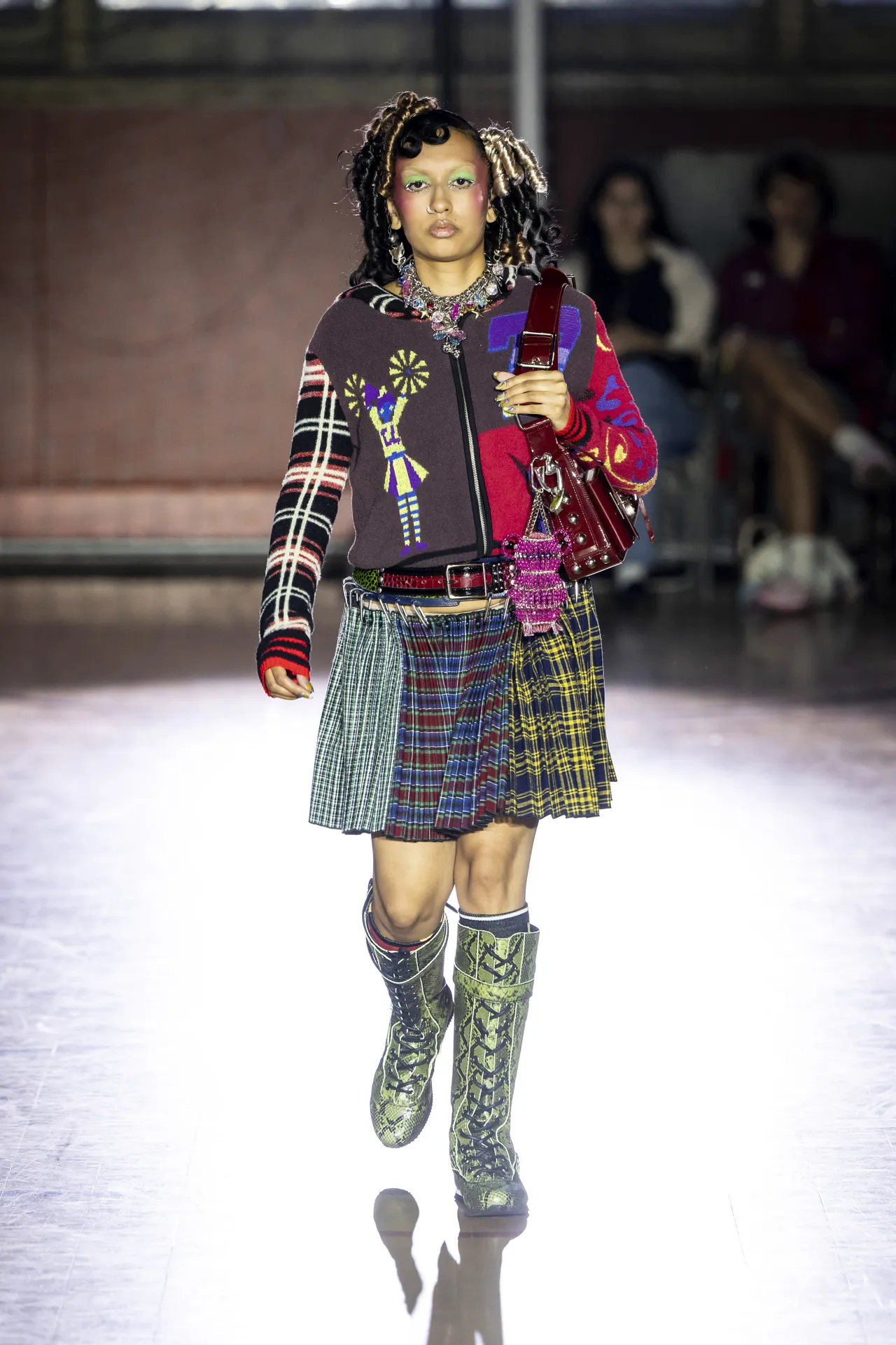 Maximalist prints styled on the catwalk at London Fashion Week SS26