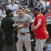 Washington Nationals' Jacob Young disputes a called third strike with umpire Malachi Moore during a game against the Cleveland Guardians on June 1, 2024.