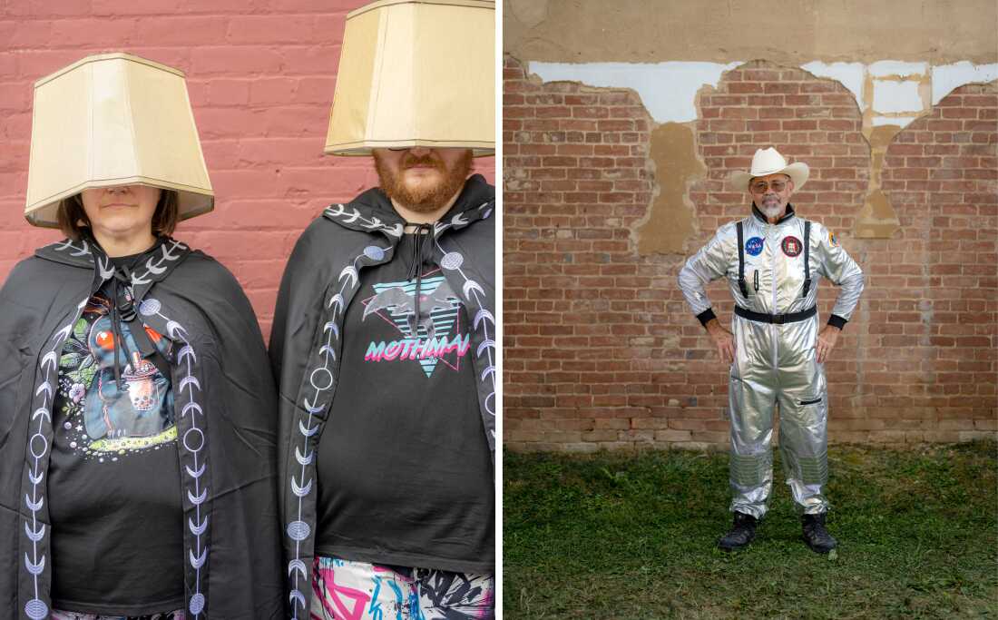 (Left) Jennie Brown (left) and her husband TiMothy Brown wear lamp shades on their heads, black capes and Mothman T-shirts. (Right) Food and drink entrepreneur Danny Jaques poses at the festival in a silver astronaut suit and straw hat.