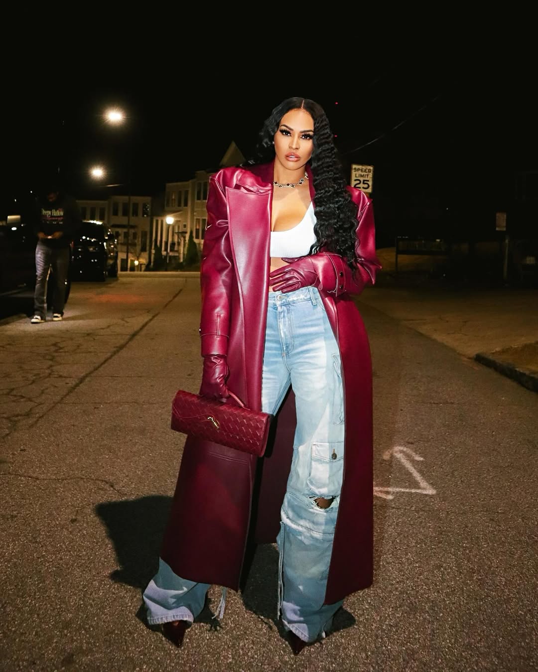 woman wearing cargo denim with long leather coat