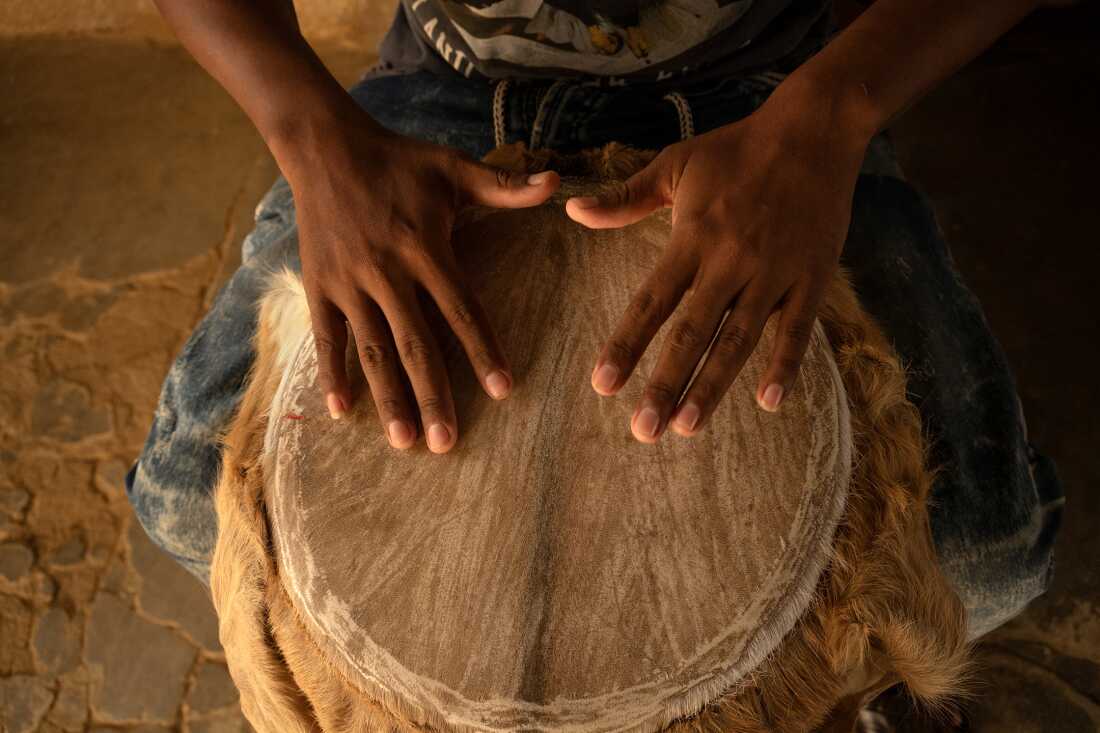 Portrait of Orlando Jose Blanco Alvarez with his tambor alegre on August 12, 2022, during the Festival Nacional Autóctono de Gaitas in San Jacinto, Colombia. A gaita ensemble, featuring Indigenous flutes and Afro-Colombian drums, performs traditional cumbia rhythms.