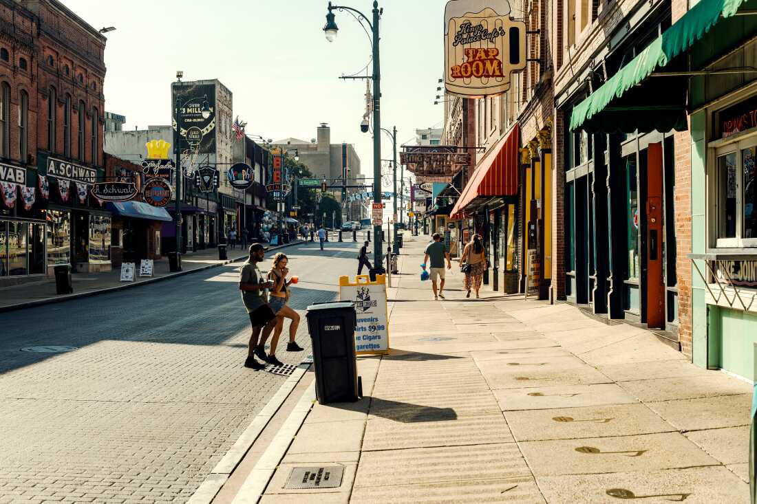 Pedestrians on Beale Street in downtown Memphis, Tennessee, US, on Tuesday, Sept. 16, 2025. President Donald Trump approved a National Guard deployment to Memphis, expanding the federal government's efforts to crack down on what he has cast as out-of-control crime in Democratic-run cities. Photographer: Houston Cofield/Bloomberg via Getty Images