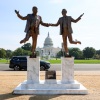 Statue of President Donald Trump and Jeffrey Epstein holding hands near the U.S. Capitol