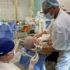 Dr. Andriy Sirko, head of neurosurgery at Mechnikov Hospital in Dnipro, Ukraine, treating a patient.