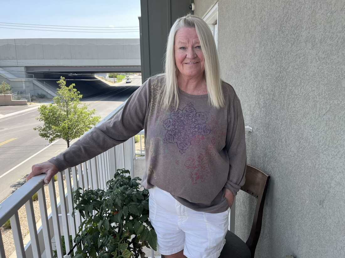 Patricia Jean Martin on the terrace of her shared apartment at The Other Side Village.