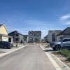 New starter homes in Plain City, Utah, alongside market-rate houses.