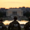 National Guard members standing near the Washington Monument in Washington, DC.