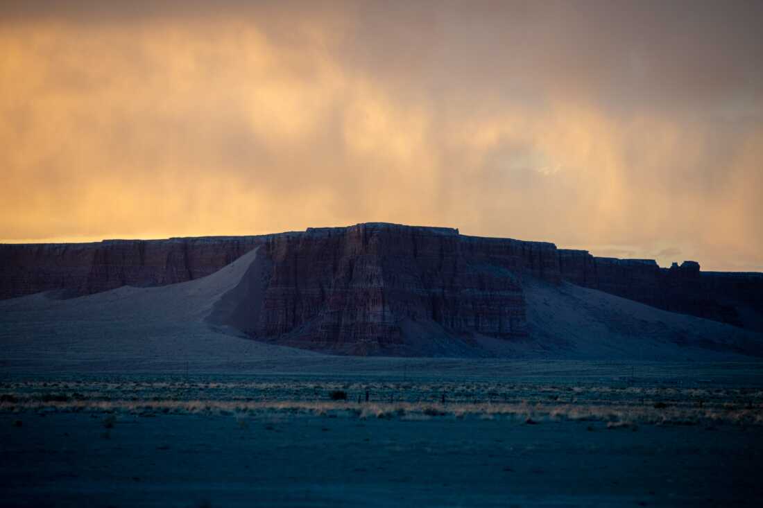 Sunset over a quiet highway leading to the Hopi Reservation mesas