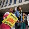Students protesting budget cuts outside the U.S. Department of Education