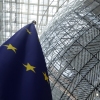 The European Union flag stands inside the atrium at the European Council building in Brussels, June 17, 2024.