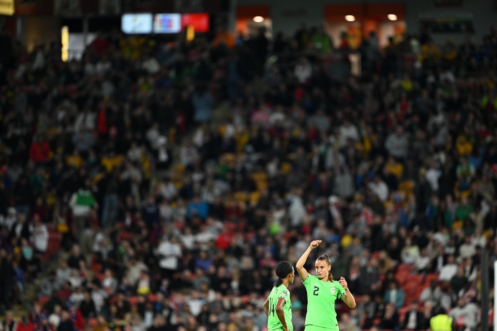Ashleigh Plumptre talks to teammate Blessing Demehin during the extra time of the round of 16 match between England and Nigeria at the 2023 FIFA Women's World Cup in Brisbane, Australia
