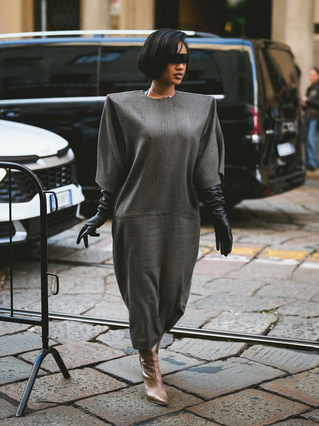 woman wearing structured fall dress 2025