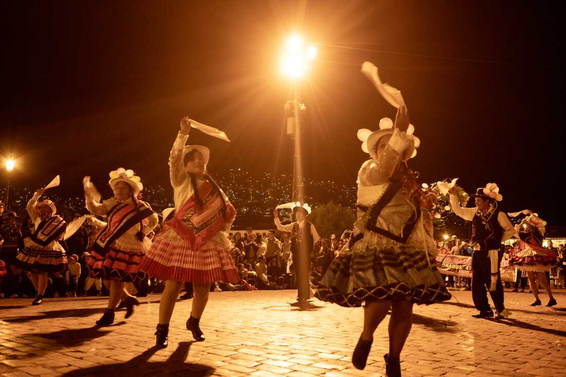 High school students dancing folkloric huayno music in Cusco's Plaza de Armas on November 3, 2024. Huayno blended with Colombian cumbia to form the unique Peruvian cumbia style known as chicha.