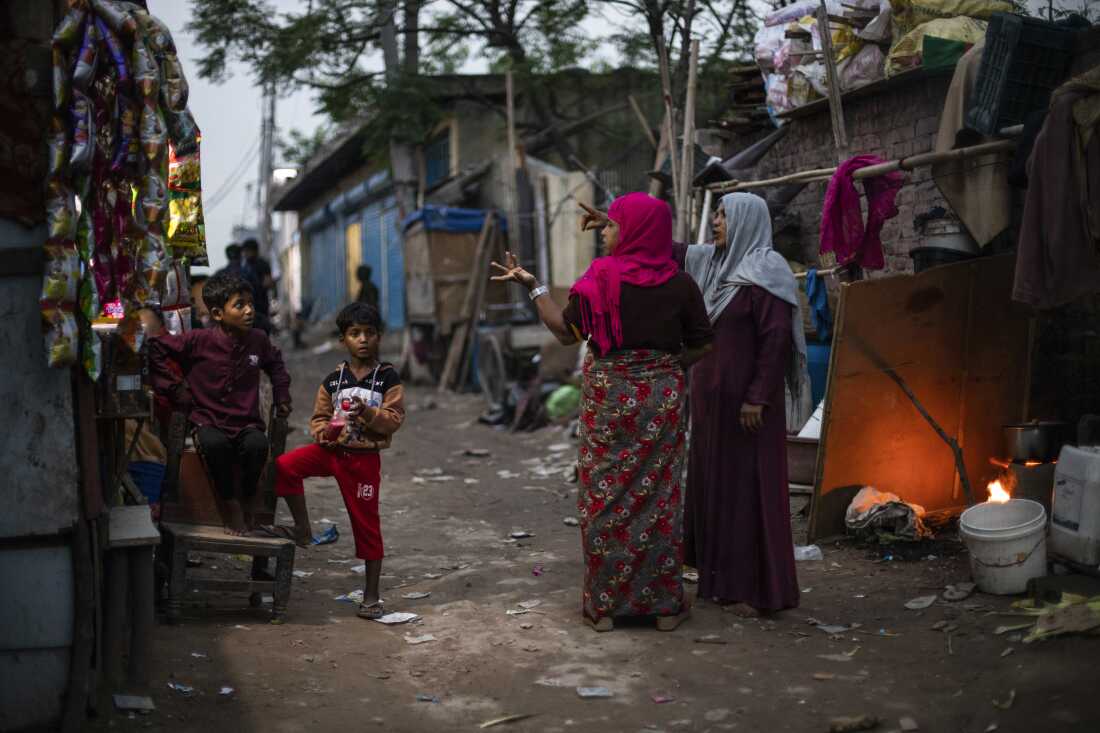 Rohingya refugee women and children at a camp in New Delhi on World Refugee Day, June 17, 2023.