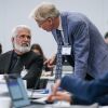 Martin Kulldorff (right) speaks with Robert Malone during a meeting of the CDC's Advisory Committee on Immunization Practices on September 18, 2025 in Chamblee, Ga.