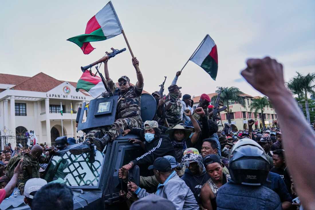 Soldiers welcomed by crowds during a memorial for protest victims in Antananarivo, Madagascar, October 12, 2025