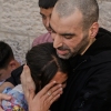 A Palestinian prisoner who was released from an Israeli prison as part of a ceasefire deal between Israel and Hamas, upon his arrival in the West Bank city of Ramallah, Monday, Oct. 13, 2025. (AP Photo/Majdi Mohammed)