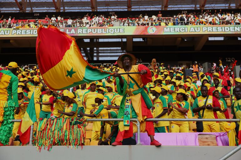 Senegal supporters cheer during World Cup qualifier