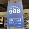 Sign for the 988 Lifeline mental health emergency hotline in Walnut Creek, California.