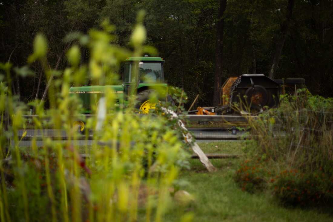 A tractor passes by the home of Virginia-based chef Michael Twitty on Sept. 29, 2025 in Fredericksburg, VA. Twitty's new cookbook Recipes from the American South will feature short histories of the recipes alongside the recipes themselves.
