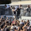 A bus carrying Palestinians released from Israeli prisons is greeted by a crowd outside the Nasser hospital in Khan Younis, Gaza Strip, on Monday.