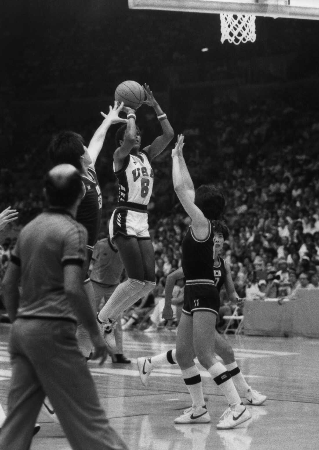 Lynette Woodard #6 of Team USA scoring against Korean players during the 1984 Summer Olympics women's basketball final in Los Angeles.
