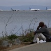 Planes lined up at San Francisco International Airport runway