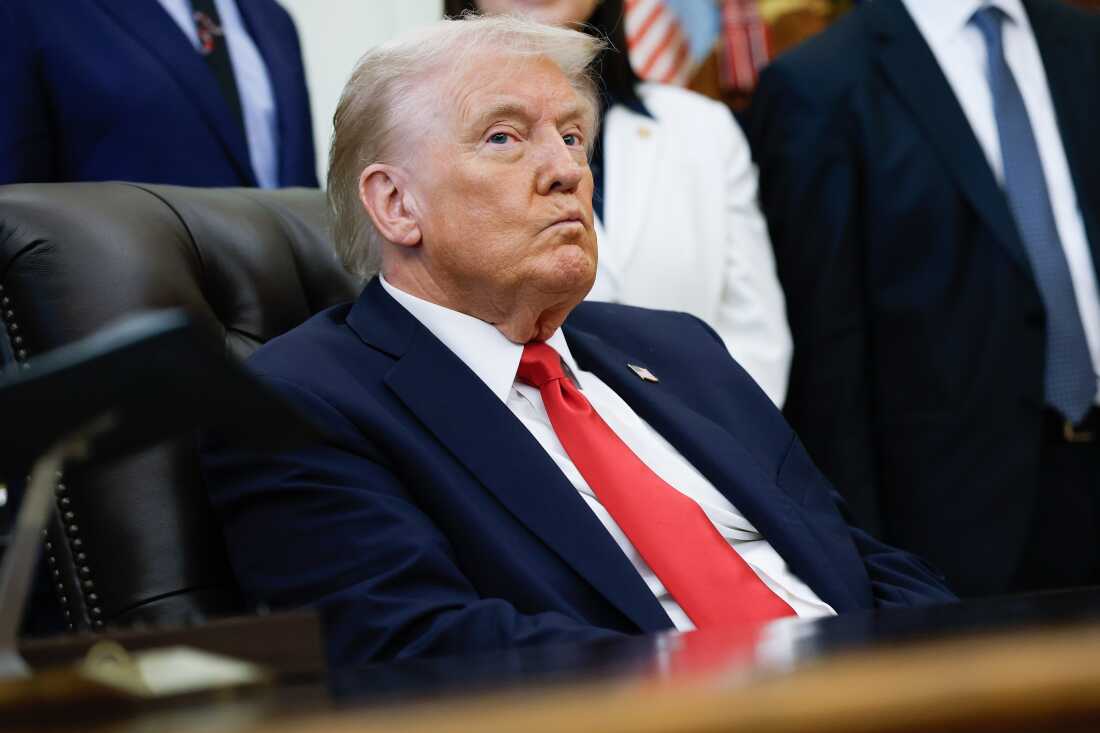 Donald Trump listening during a White House event on October 16