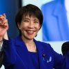 Sanae Takaichi celebrates after winning the LDP leadership election in Tokyo.