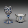 A French porcelain zarf and cup from the mid-19th century, associated with coffee drinking traditions.