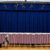 A voter exits a polling booth in Lancaster, New Hampshire, on Election Day, November 5, 2024.