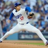 Los Angeles Dodgers pitcher Shohei Ohtani throws against the Milwaukee Brewers during the first inning in Game 4 of baseball's National League Championship Series, Friday, Oct. 17, 2025, in Los Angeles.