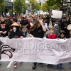 Youth leading a march celebrating Indigenous Peoples' Day in Seattle, 2023