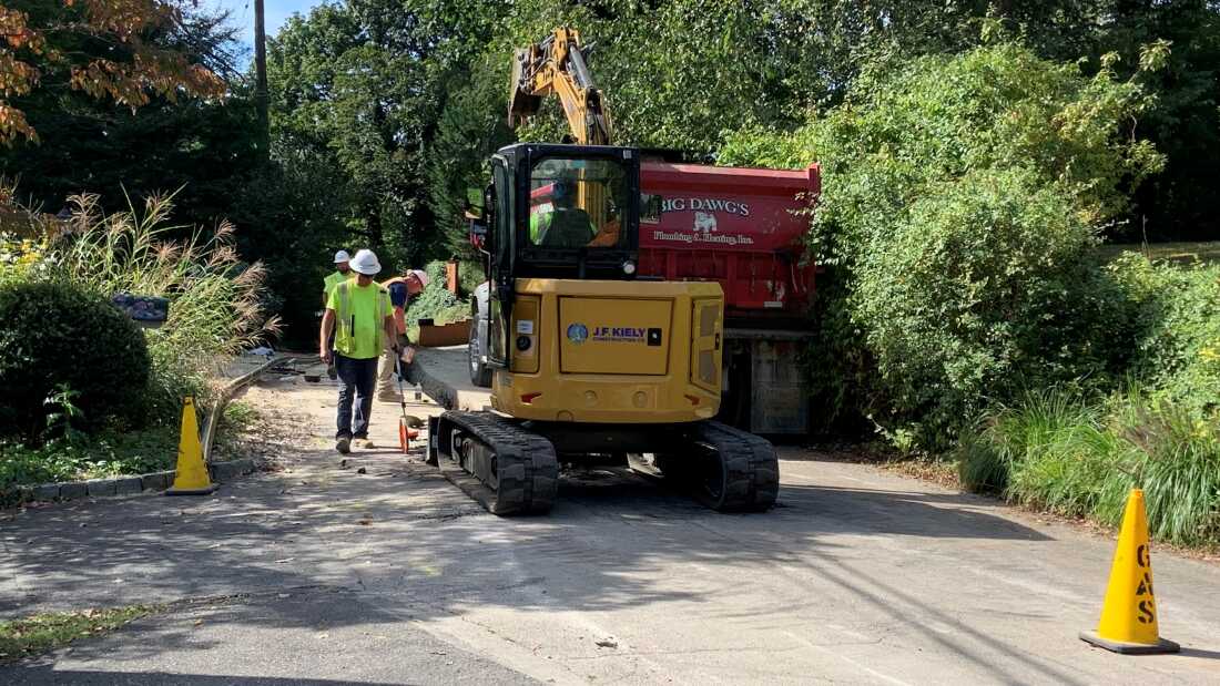 Gas pipeline workers in Wyncote, Pa. replace aging pipes prone to methane leaks, contributing to rising gas bills despite low wholesale prices.