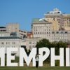 A woman taking a selfie with the Memphis, Tenn. skyline in the background, September 29.